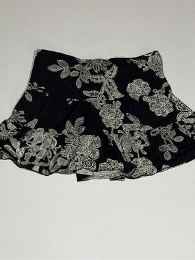 Urban Behavior Black Mini Skirt with White Floral Print